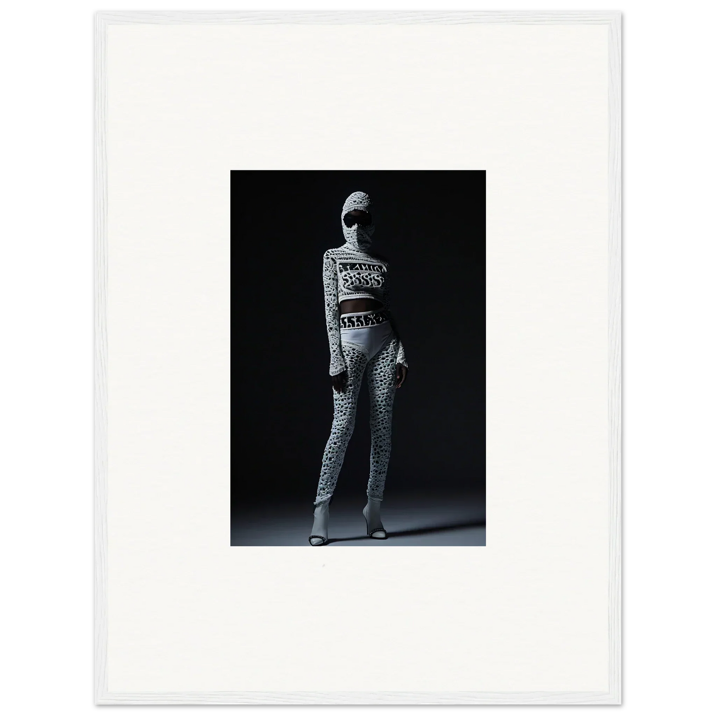 Black and white image of a person in a patterned bodysuit, perfect for Chic Mirage wall art