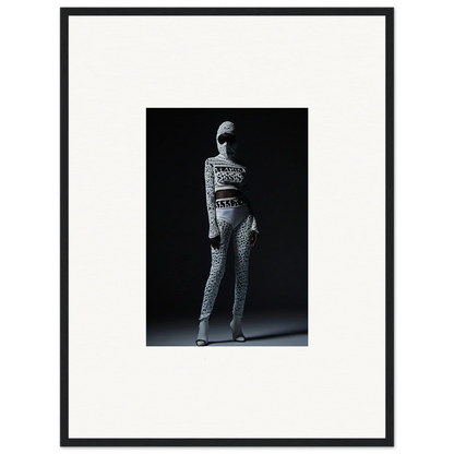 Black and white photo of person in patterned outfit for chic mirage framed wall art