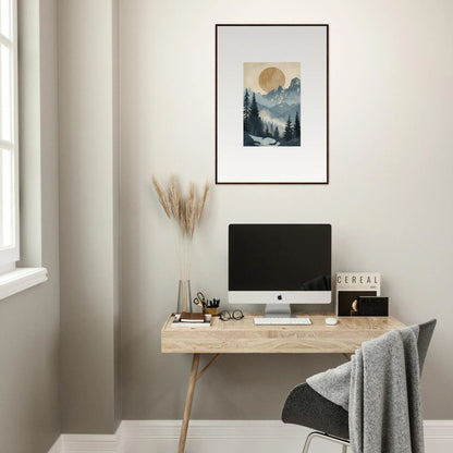 Minimalist wooden desk with computer monitor and framed wall art for stylish room decor