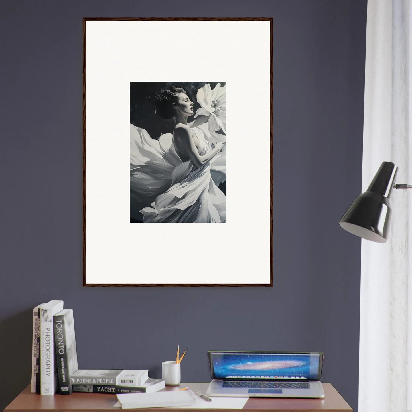 Framed black and white wall art of dreams blossom with a person and flowing fabric