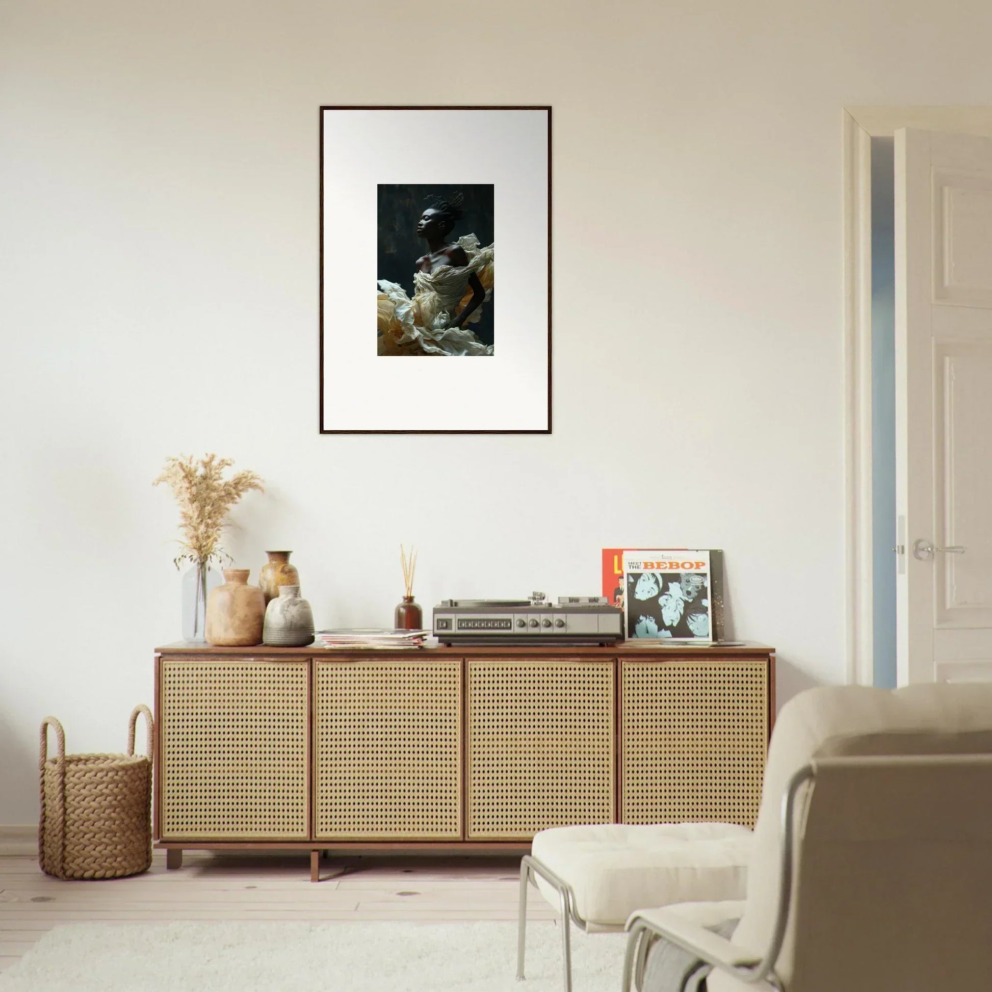 Rattan-fronted wooden sideboard with decorative objects on top.