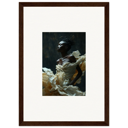 Framed artwork depicting a person emerging from billowing white fabric against a dark background.