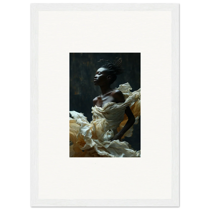 Portrait of a person with dark skin surrounded by flowing white fabric.