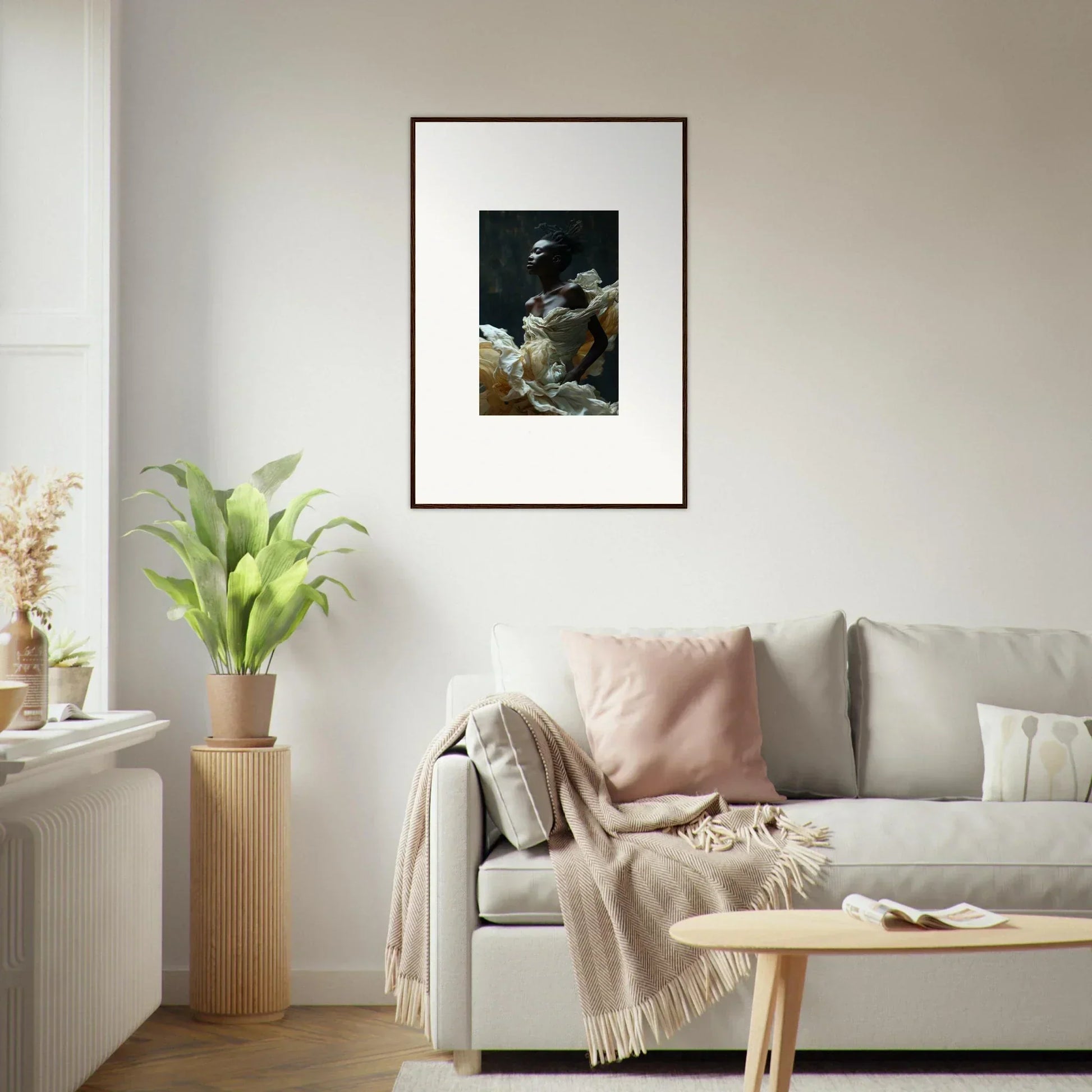 Framed artwork depicting a dark, moody scene hanging on a wall.