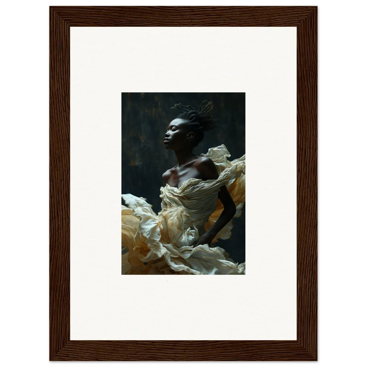 Framed portrait photograph of a person emerging from billowing white fabric against a dark background.