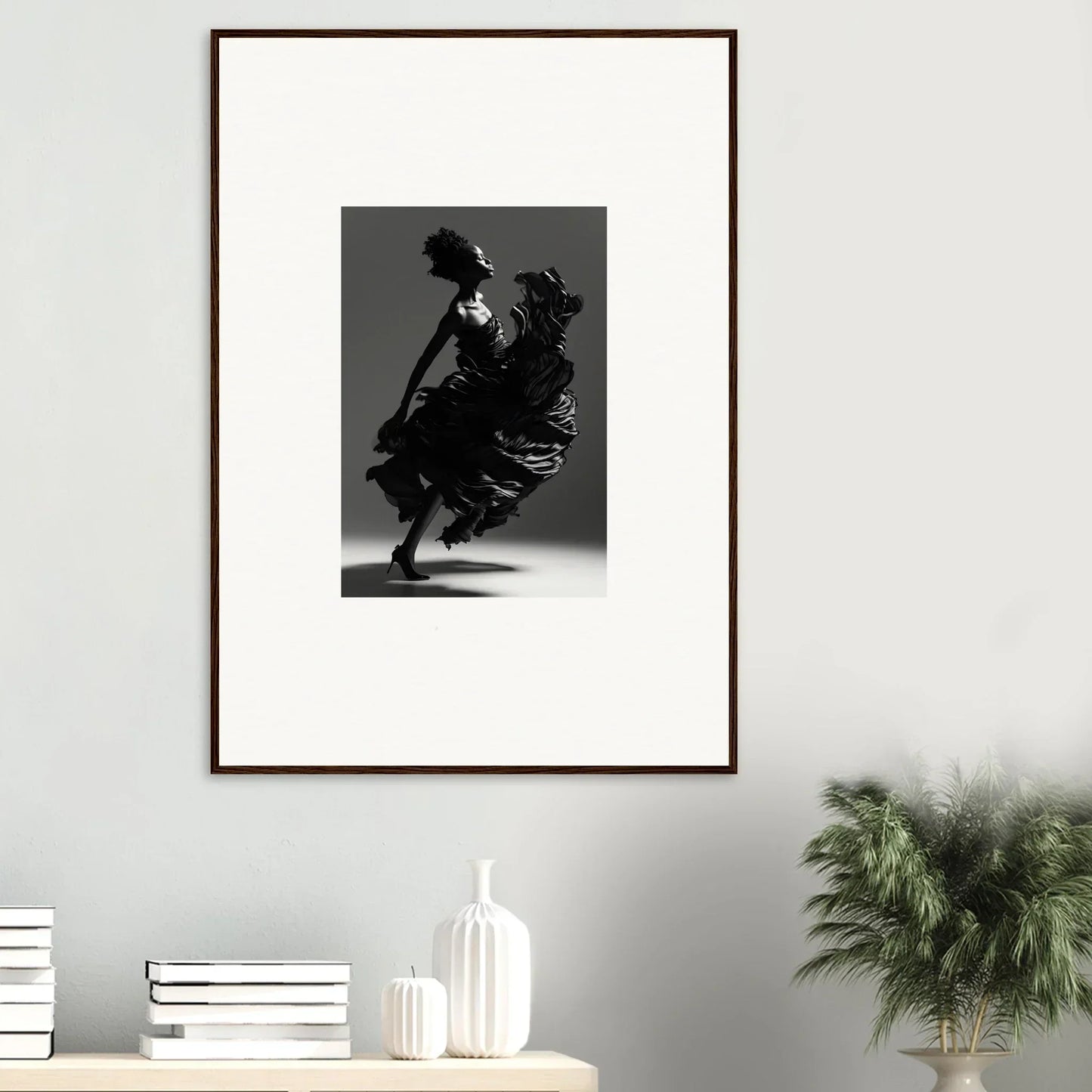 Framed black and white photograph of a dancer in motion, perfect for room decor