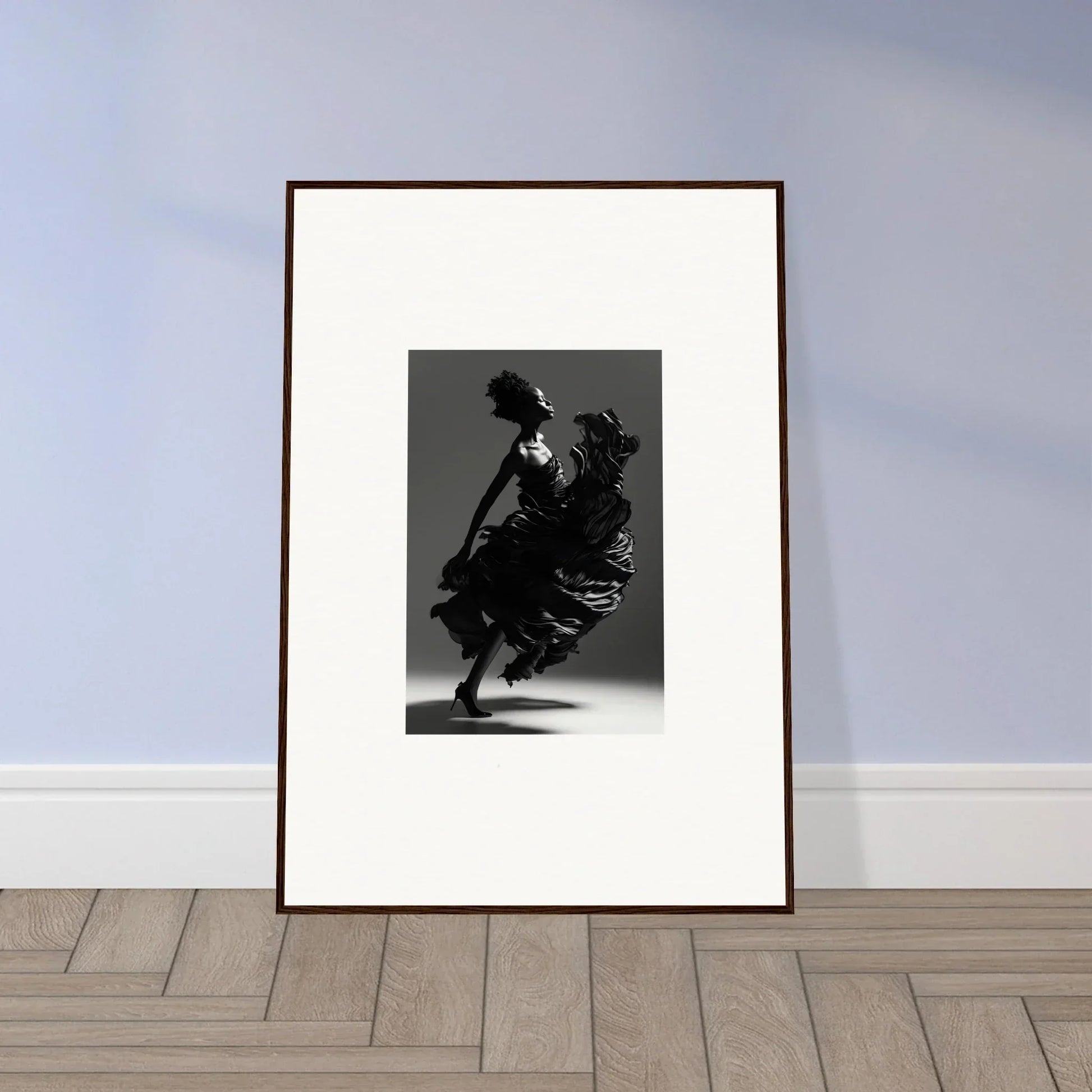 Framed black and white photograph of a dancer, perfect for room decor or wall art