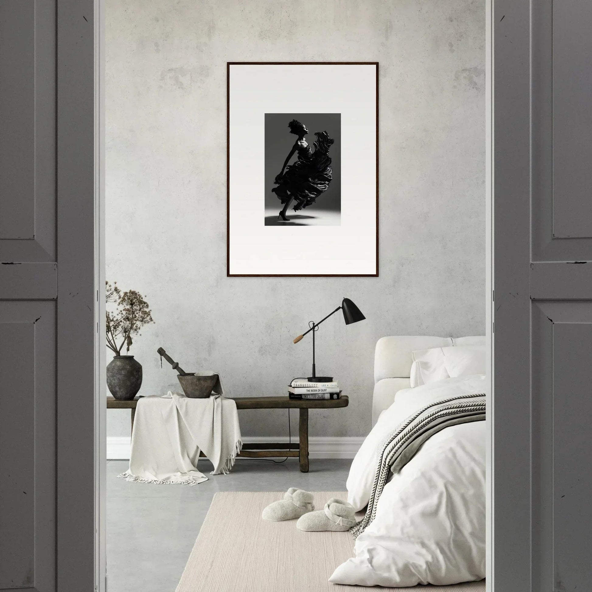 Minimalist bedroom with framed wall art as focal point for stylish room decor