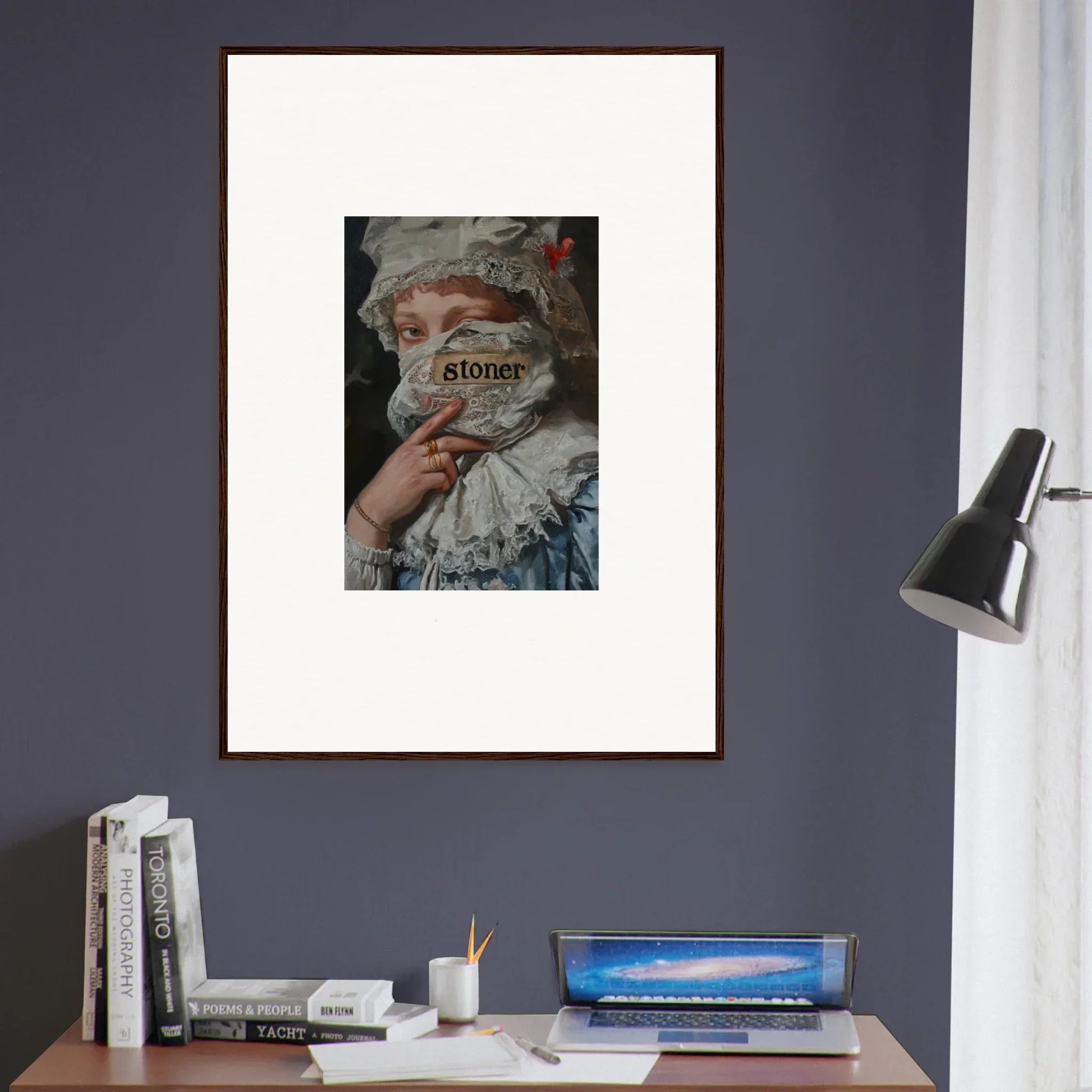 Framed wall art of a person with a collar holding Stories for Marvel Muse room decor