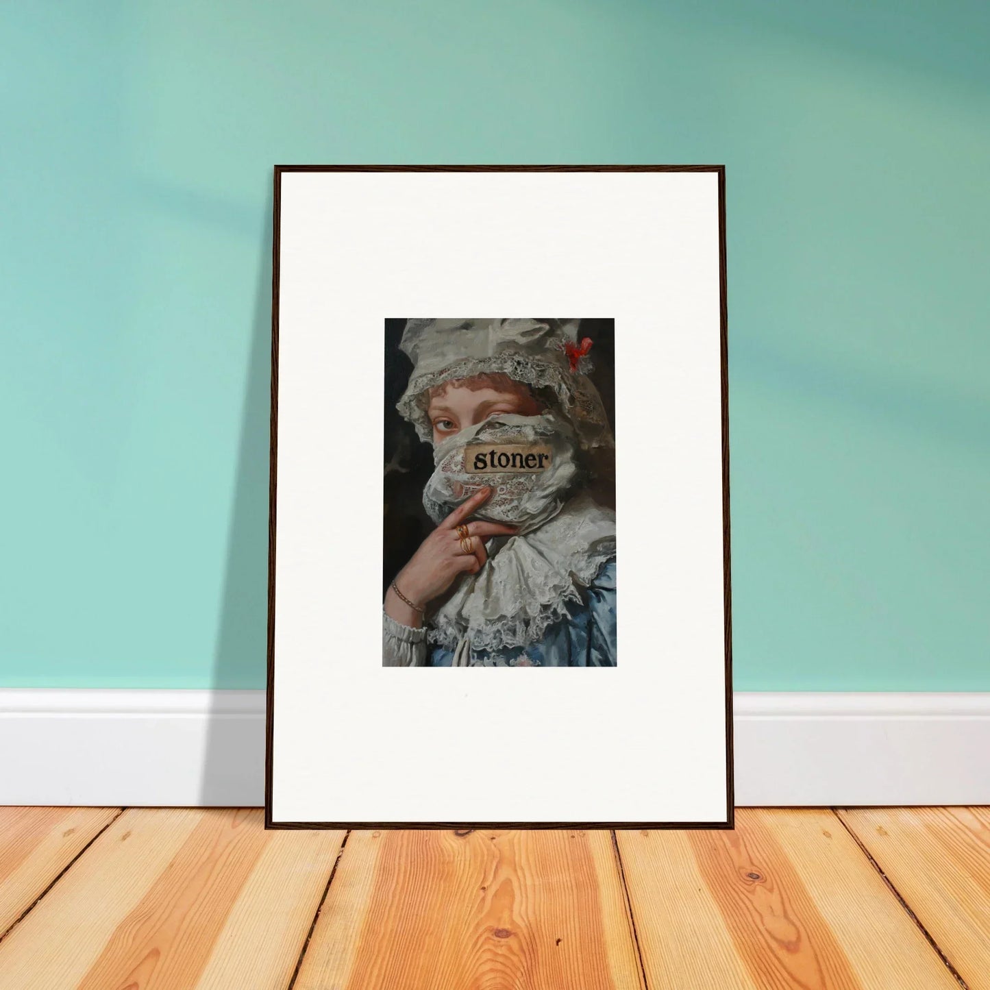 Framed wall art of a person with obscured face and ’stoner’ text for unique room decor