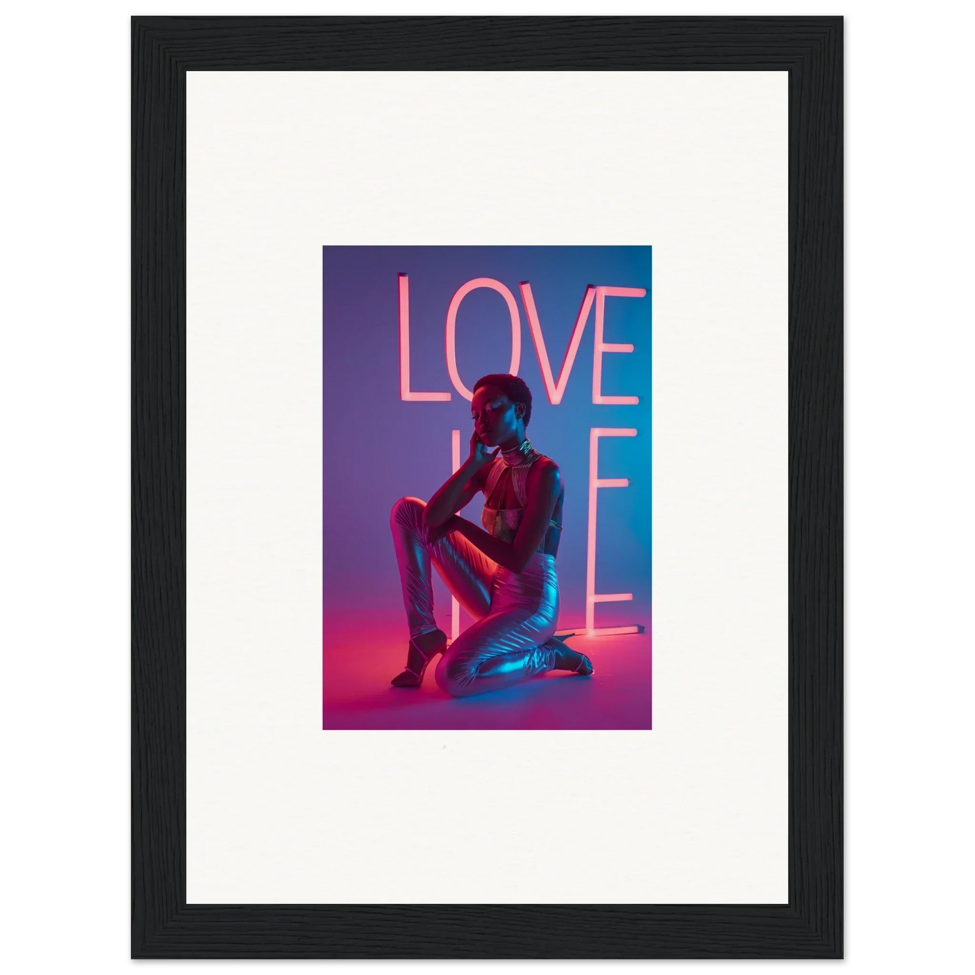 Framed canvas print of neon rapture with a silhouette and LOVE in pink, perfect room decoration