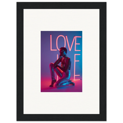 Framed canvas print of neon rapture with a silhouette and LOVE in pink, perfect room decoration