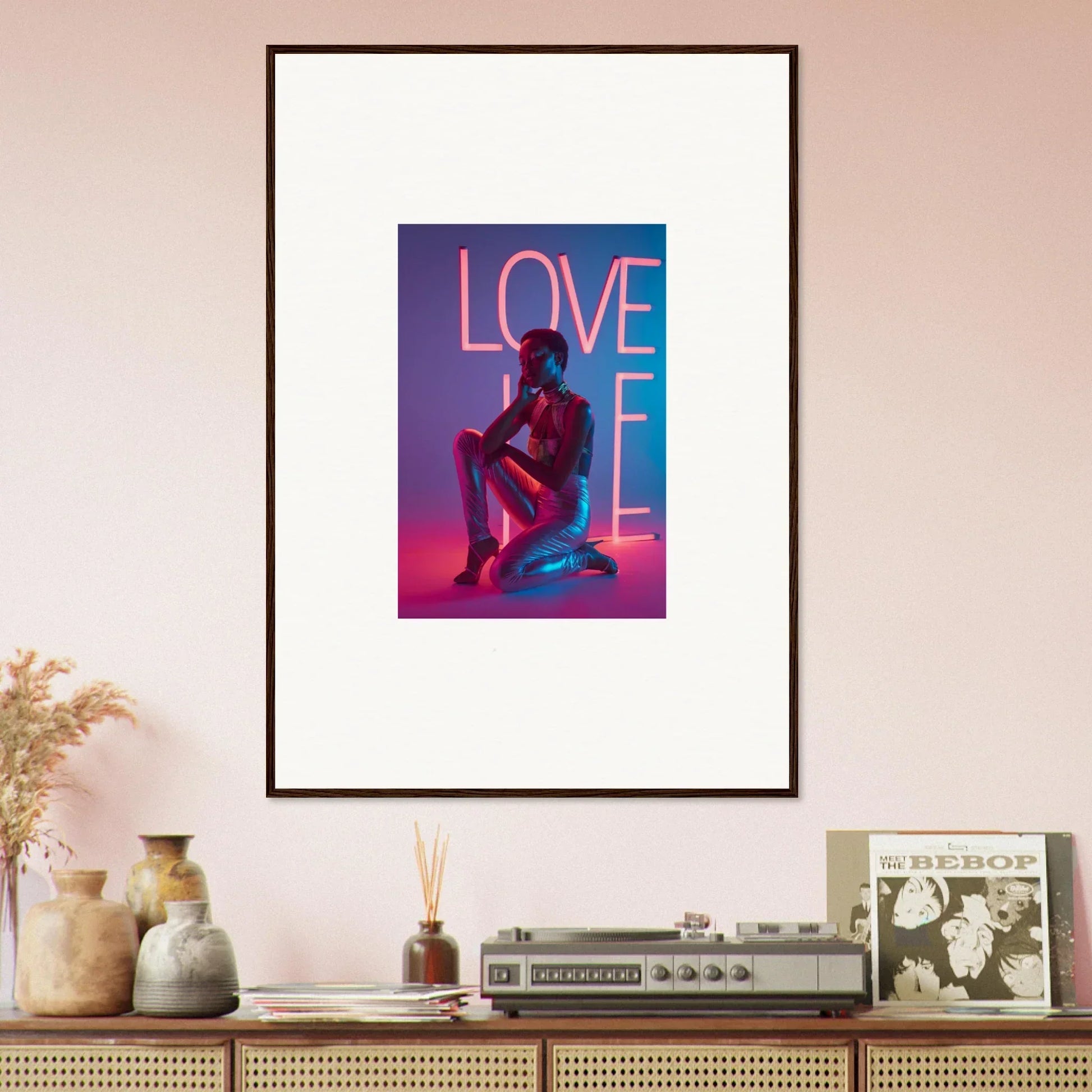 Framed canvas print of neon rapture art with LOVE sign and silhouette in pink and blue