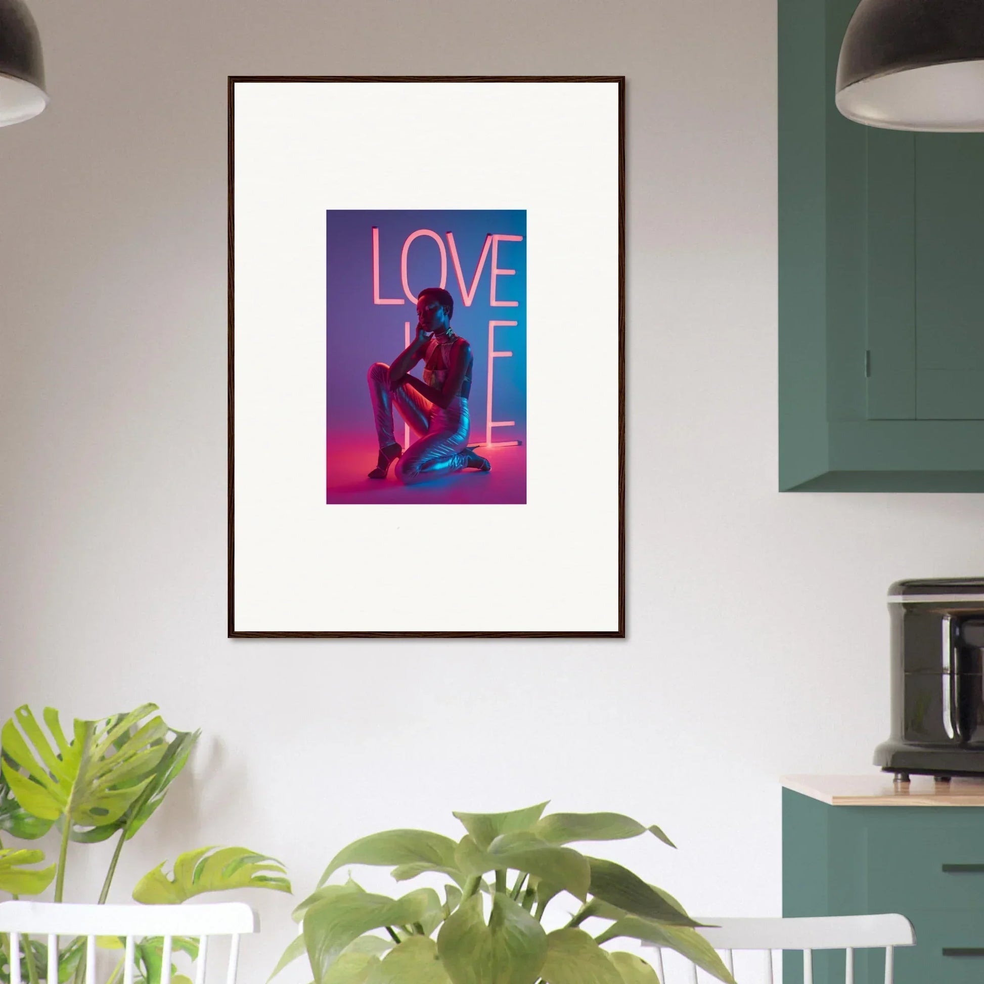 Framed canvas print of neon LOVE sign and seated figure for vibrant room decoration