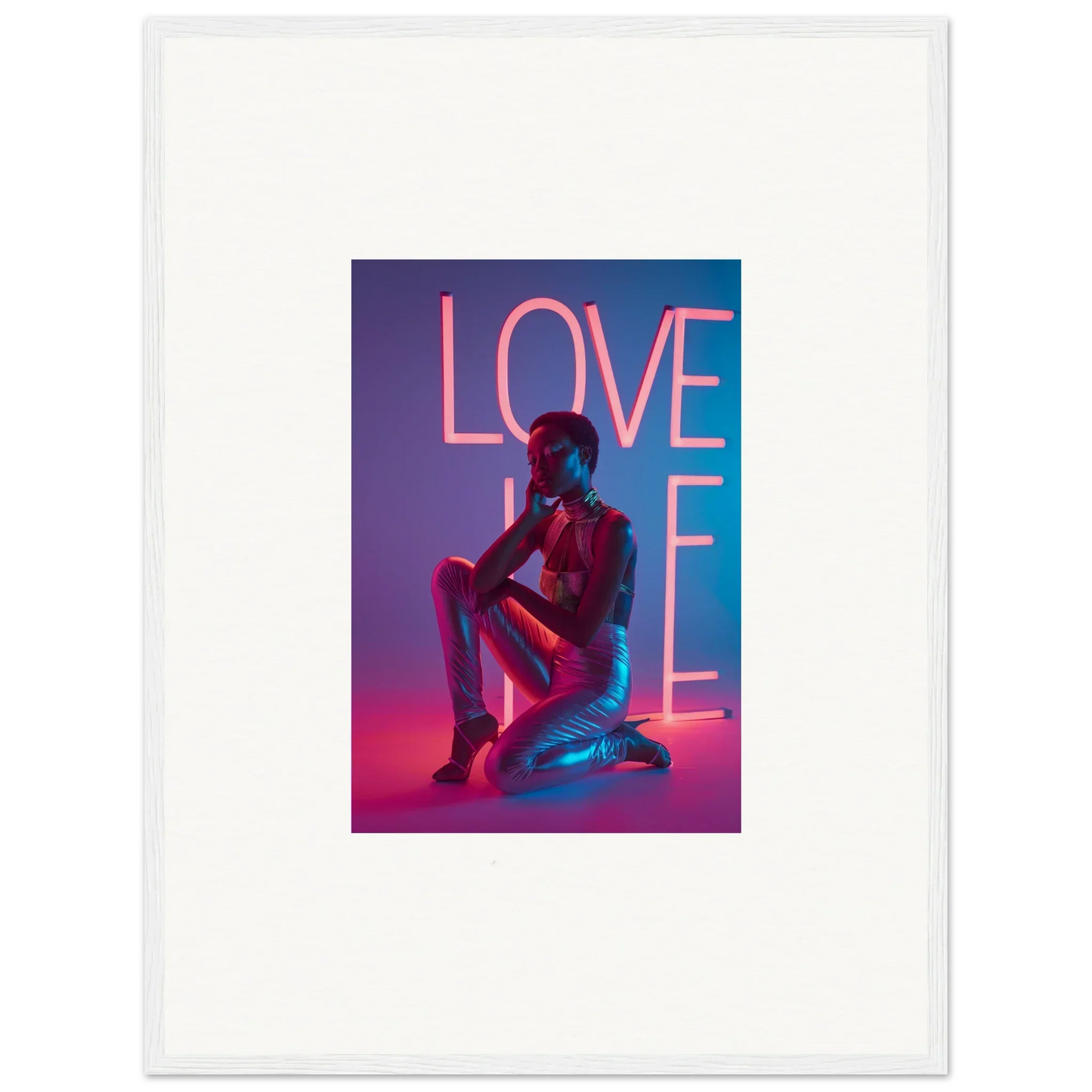 Framed canvas print of a neon rapture silhouette and LOVE for trendy room decoration