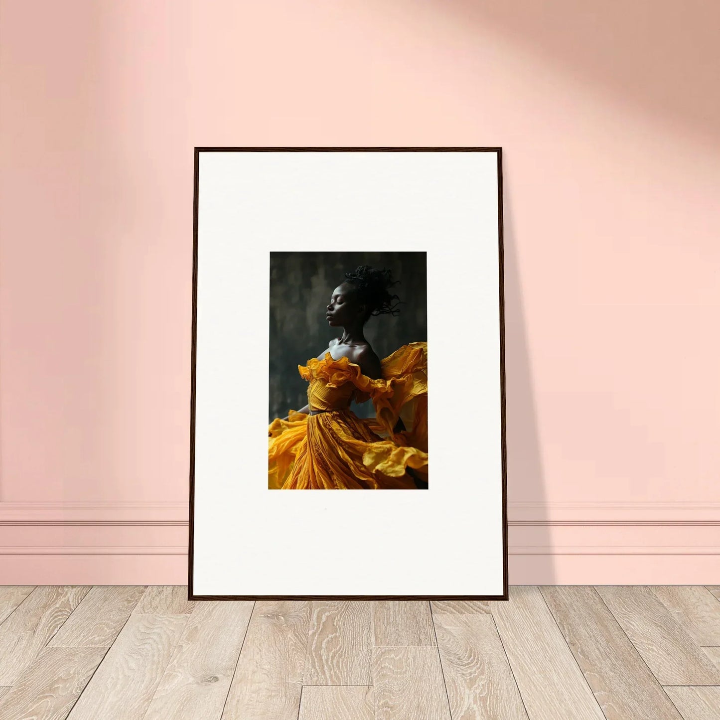 Framed wall art of a figure in a yellow dress, perfect for sunlit whispers room decor