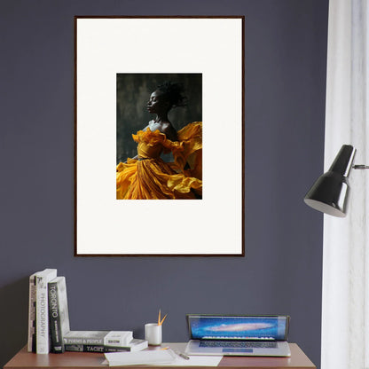 Framed wall art of a person in a yellow-orange dress for vibrant room decor