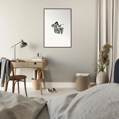 Minimalist bedroom with wooden desk, lamp, and framed wall art embodying Drizzle Reverie