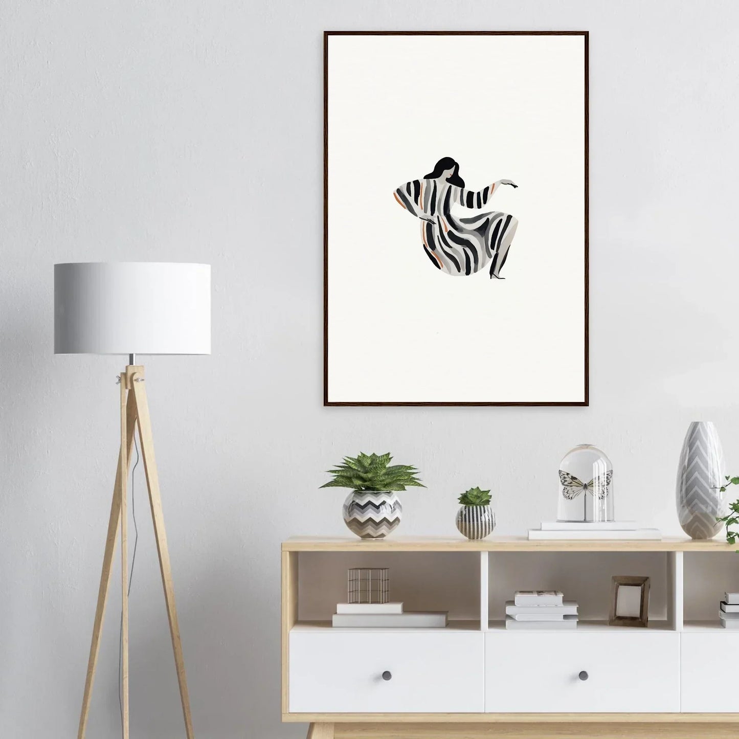 Framed wall art featuring a zebra-patterned human figure for stylish room decor