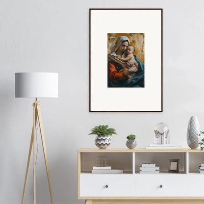 Framed wall art of a woman embracing a baby, perfect for room decoration