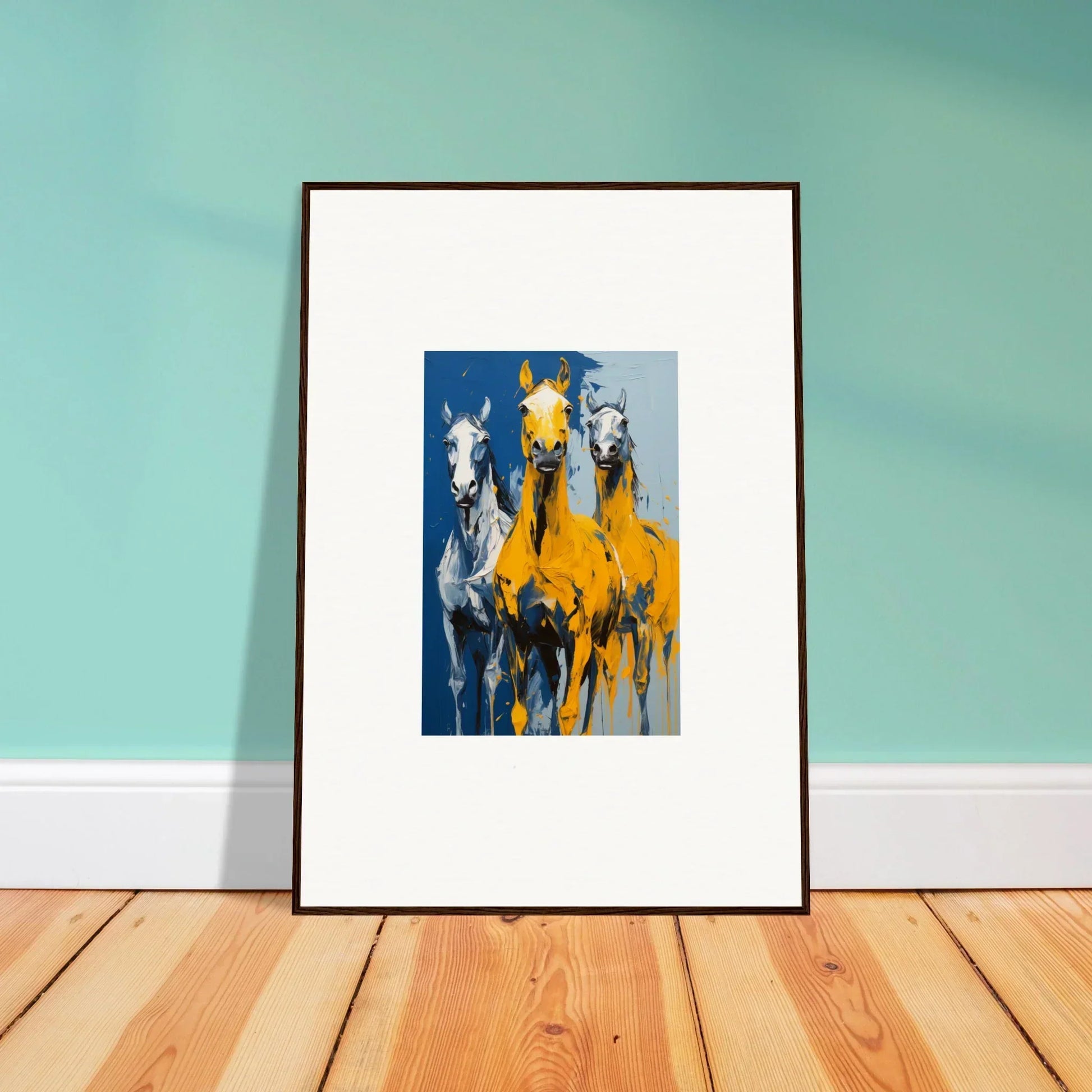 Framed wall art of three stylized horses in blue, white, and yellow for Eleven Sunrise room decor