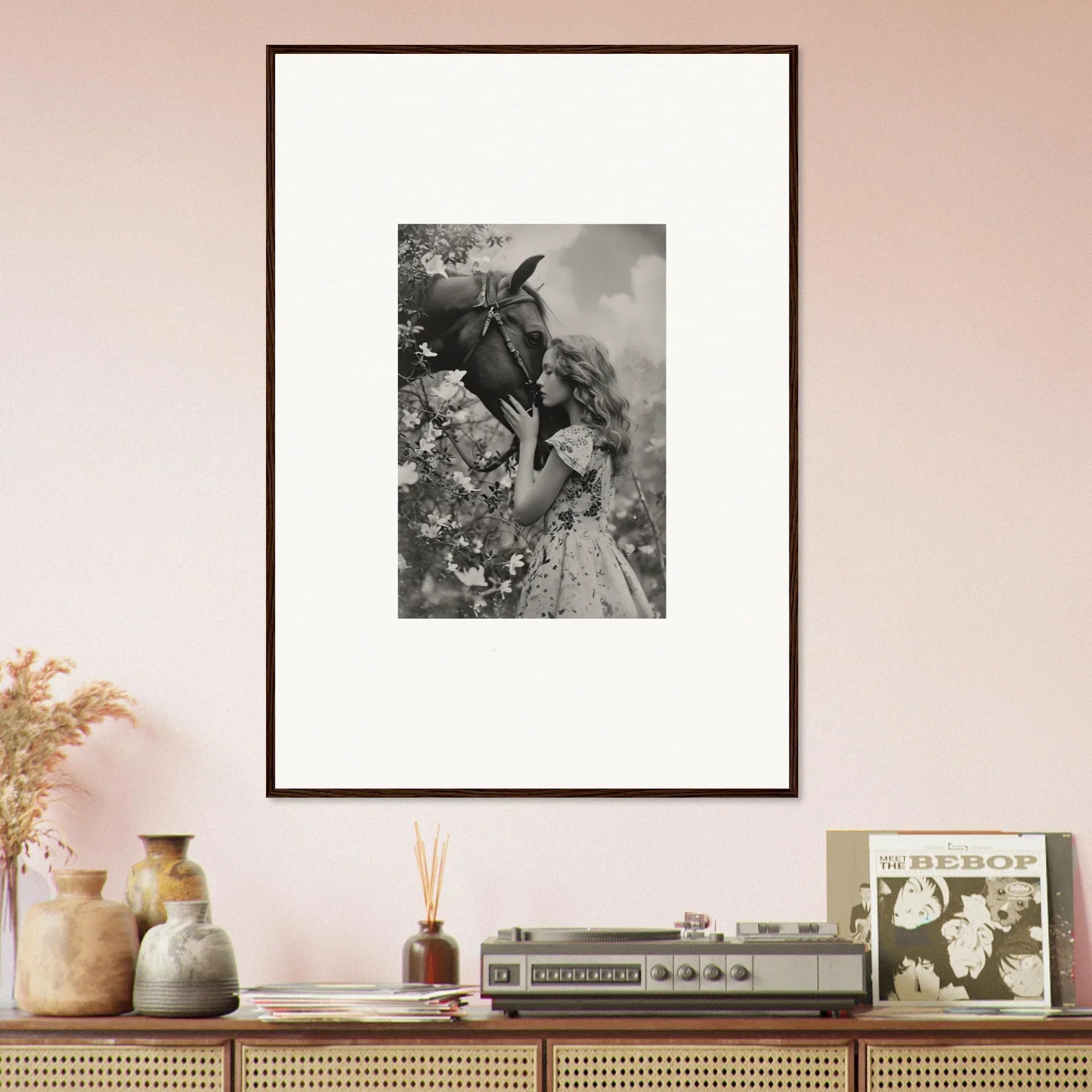 Framed canvas print of a person with a hat among flowers for stylish room decoration