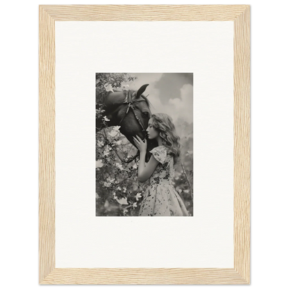 Framed black and white photo of a girl enjoying flowers for room decoration