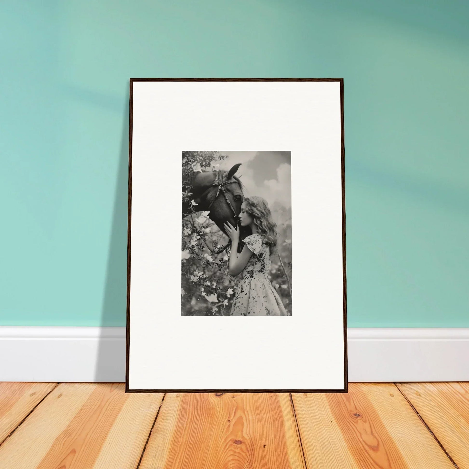 Framed black and white photo of a woman with a donkey, perfect for room decoration