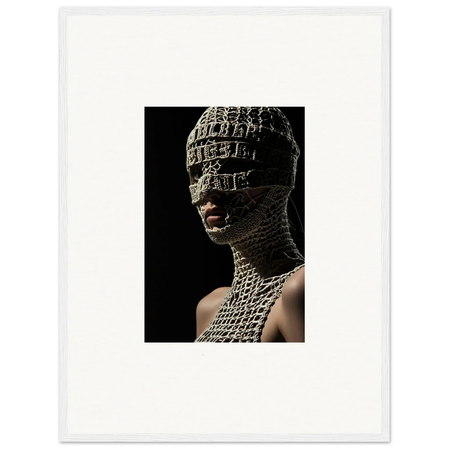 Striking portrait of a person wearing an intricate, textured head and neck covering resembling scales or chainmail, with only their mouth visible.