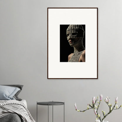 Framed artwork depicting a figure with intricate body paint and headdress against a dark background.