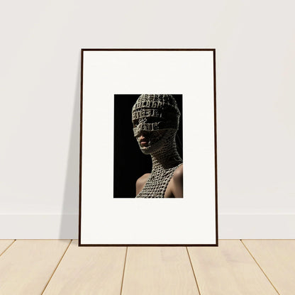 Framed photograph of a sculptural bust with textured, grid-like surface patterns.