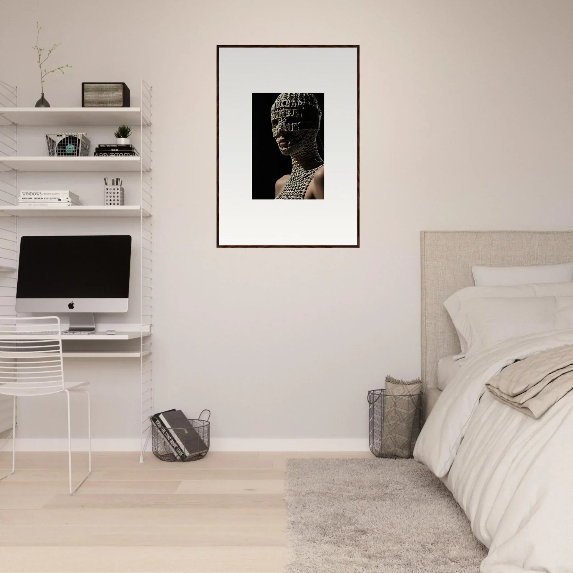 Framed artwork depicting a Buddha statue’s head.