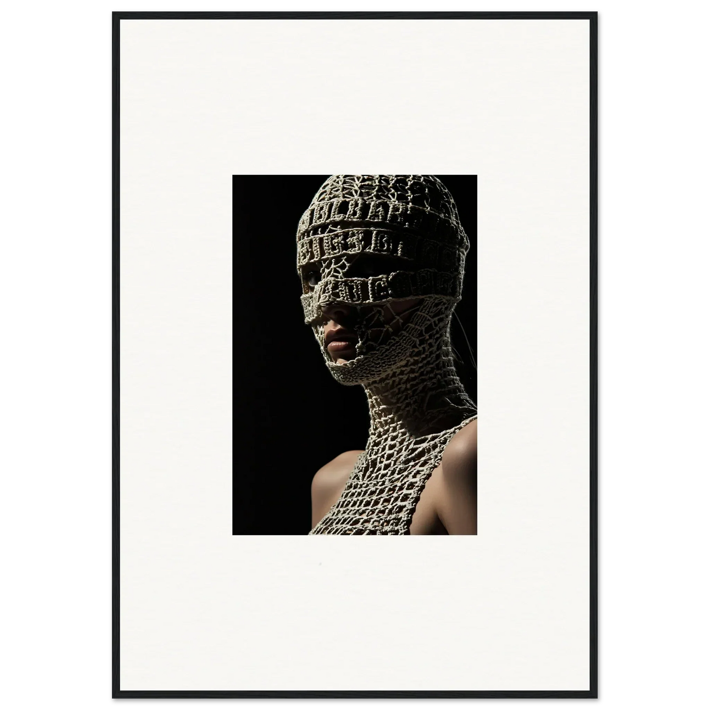 Sculptural bust covered in textured, patterned material resembling scales or hieroglyphs.