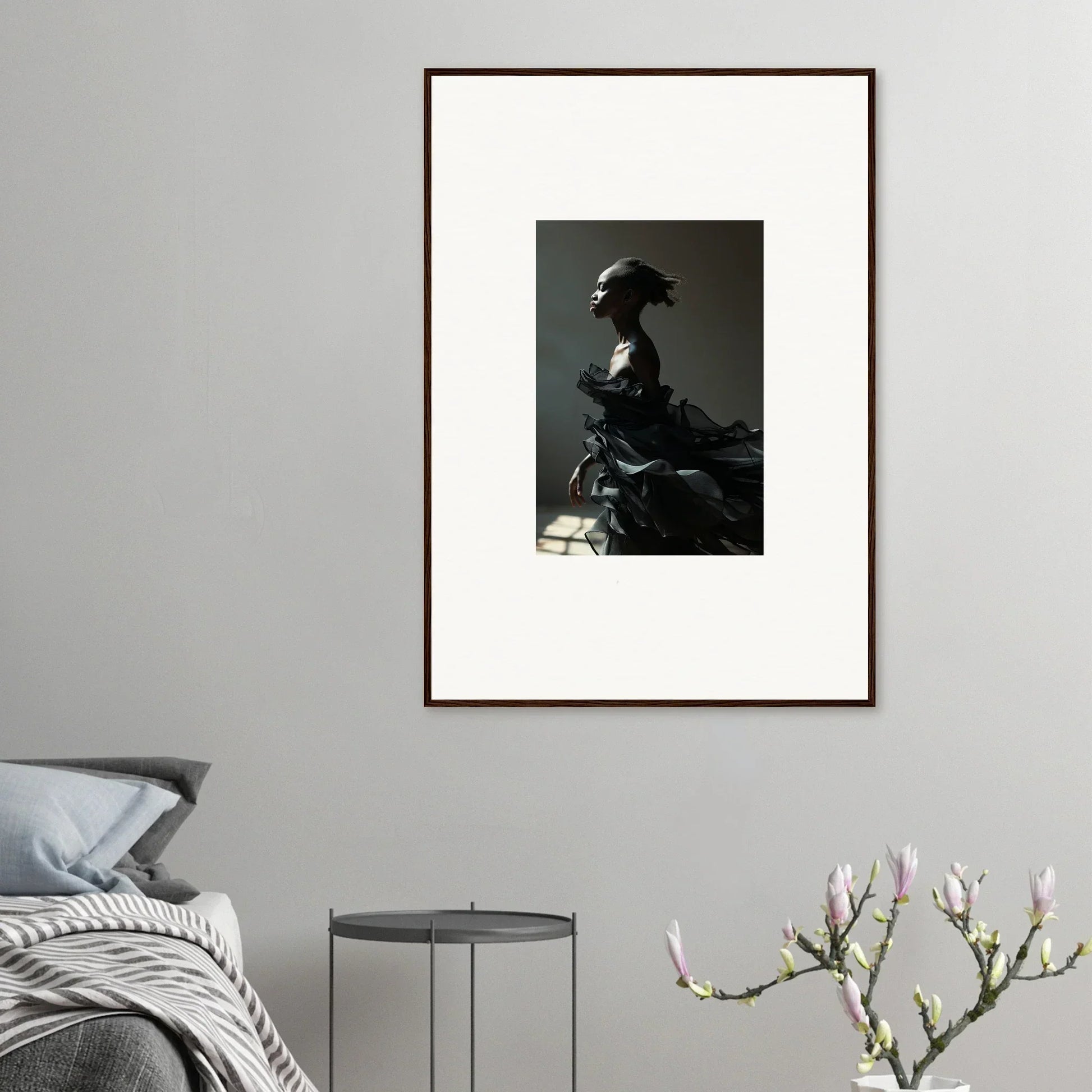 Framed black and white photograph of a person in profile for black alchemy room decor