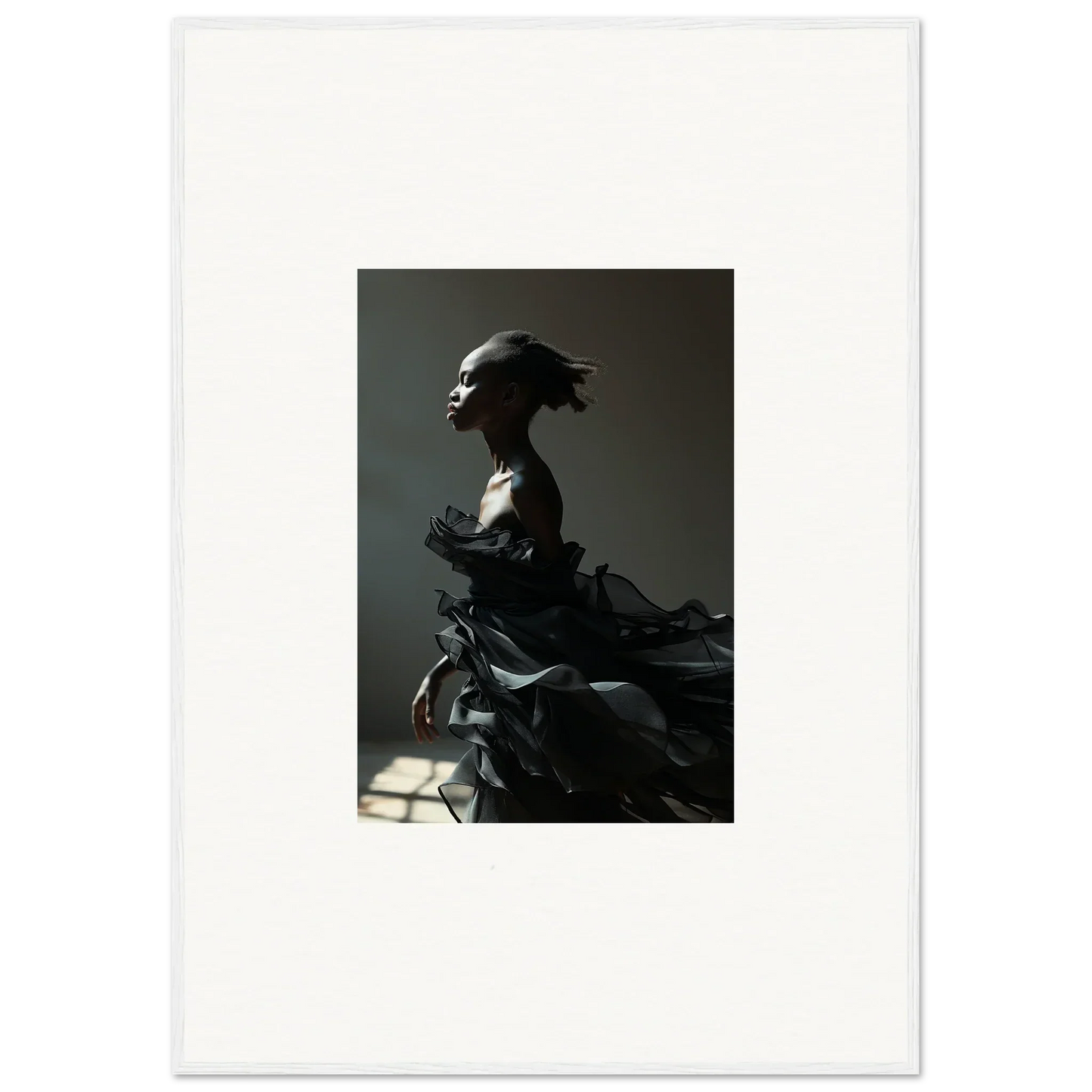 Silhouetted sculpture figure with headdress, perfect for Black Alchemy room decor