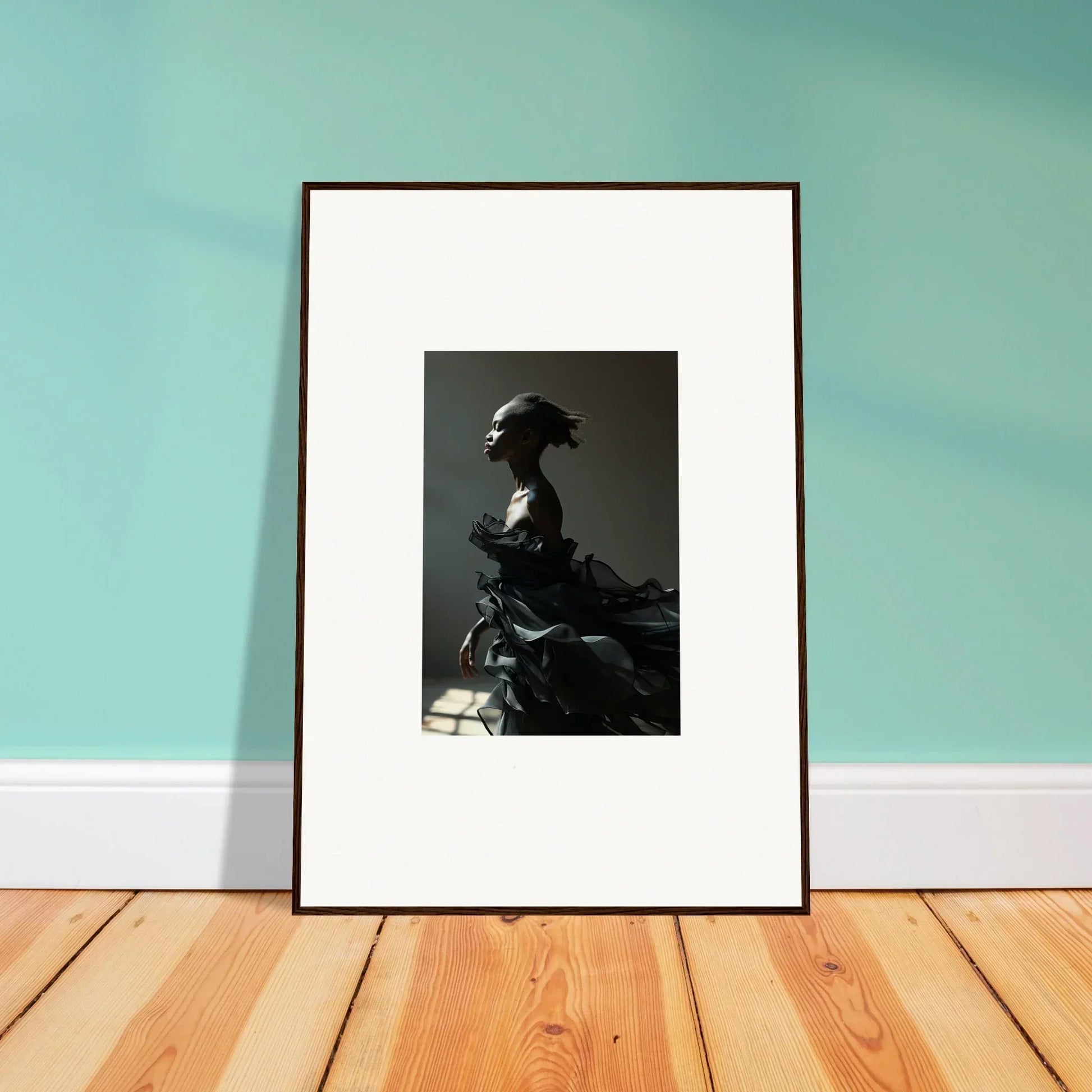 Framed black and white photograph of a person in profile, perfect for Black Alchemy room decor