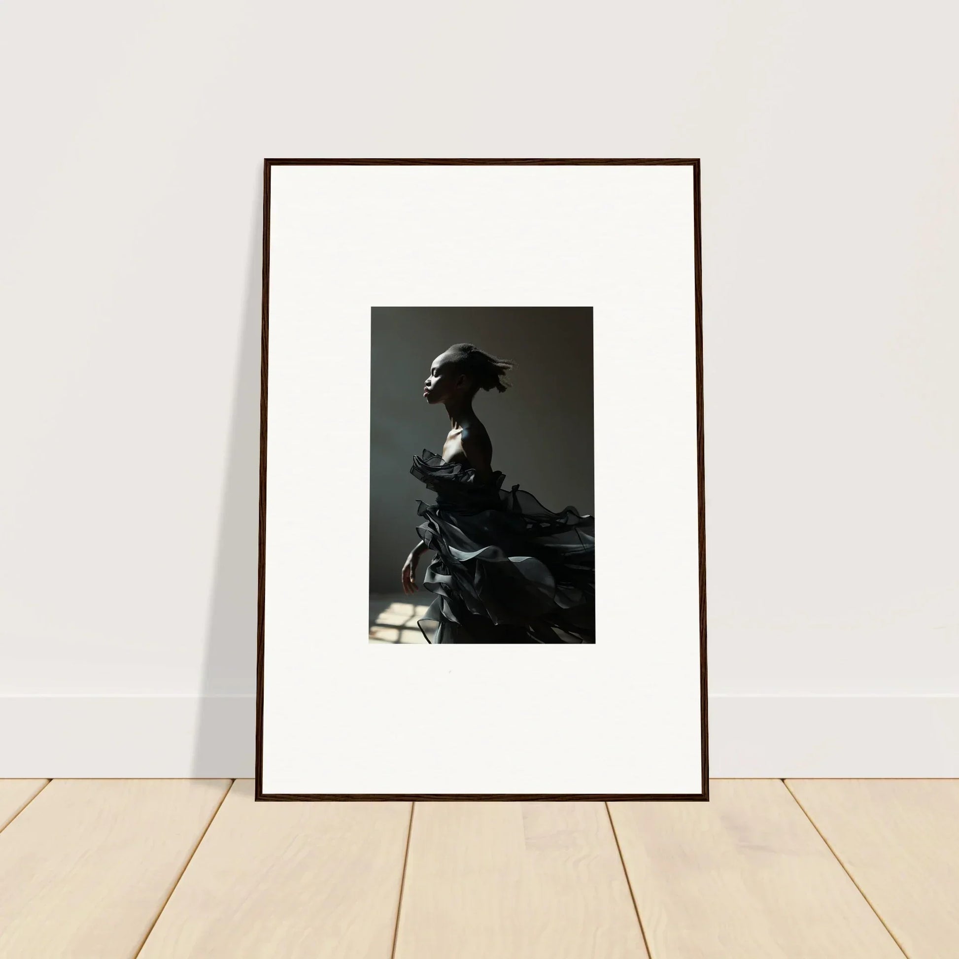 Framed black and white photograph of a person in profile, perfect for black alchemy room decor