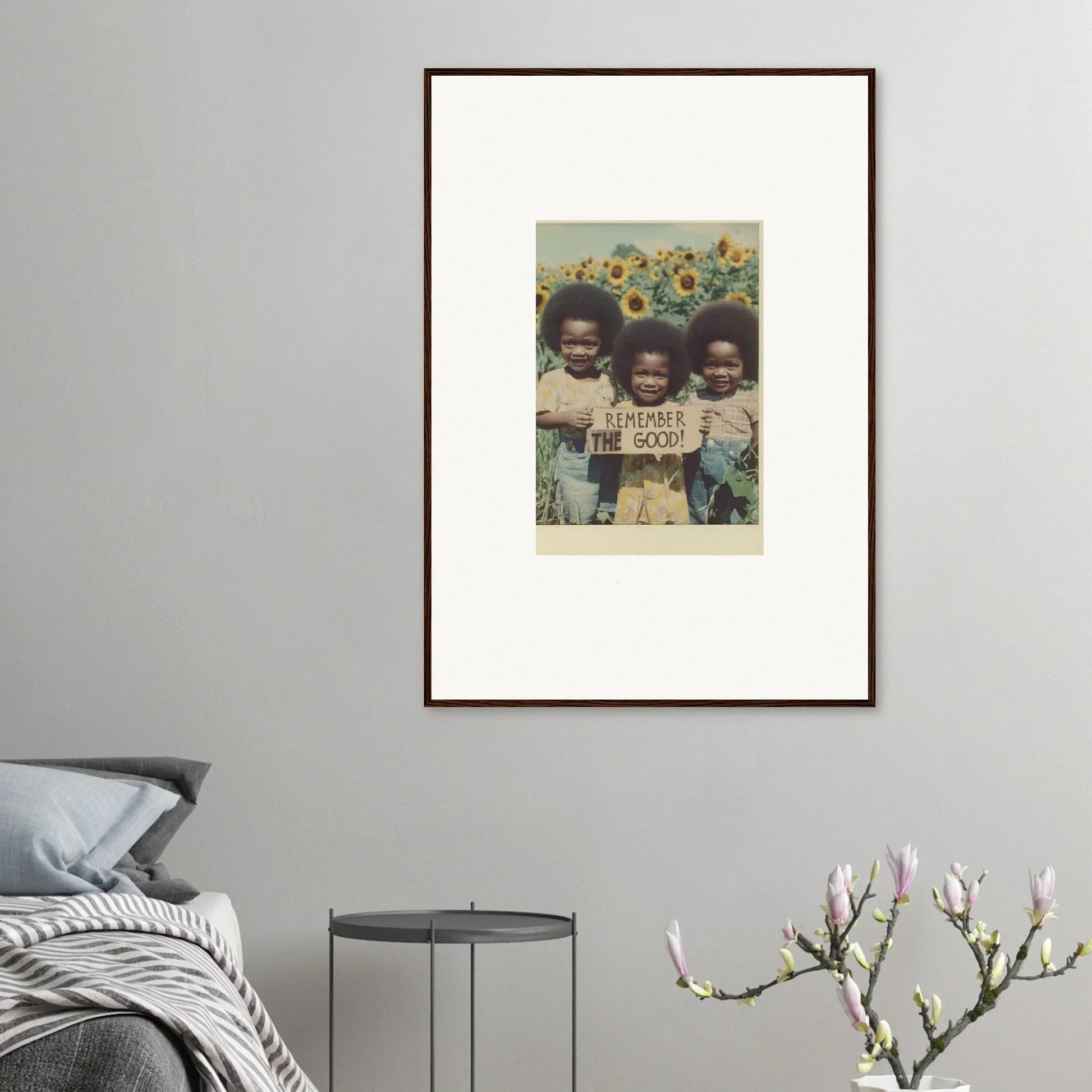 Framed photo of kids with a sign in a sunflower field for bloom moments room decoration