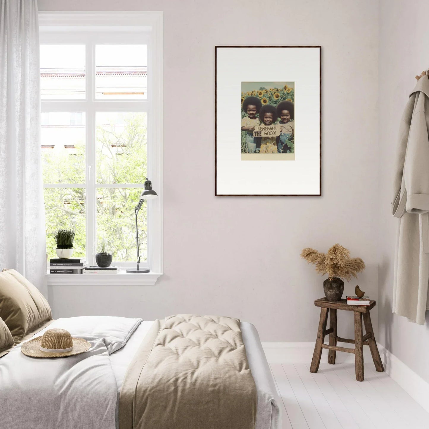 Bright and airy bedroom featuring minimalist decor and a stunning canvas print for bloom moments