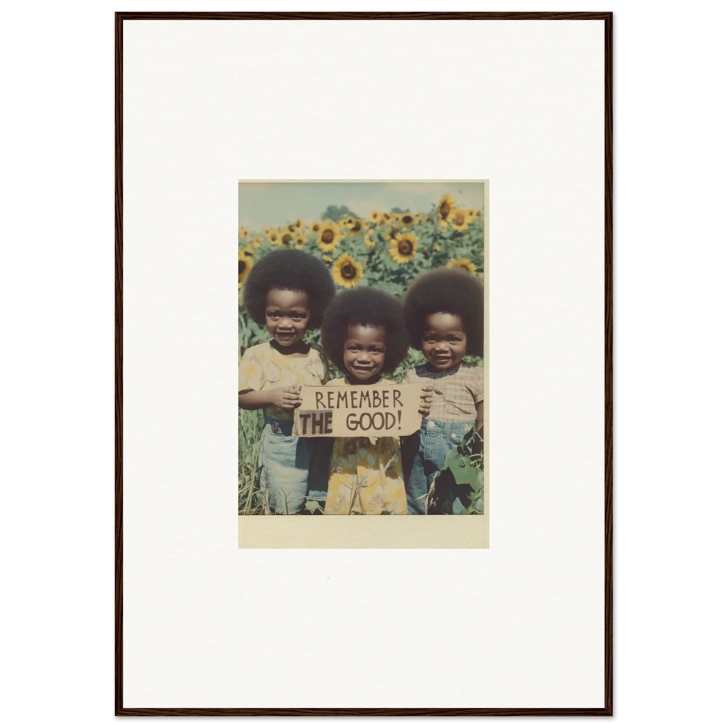 Framed photo of kids with Remember the Good sign in sunflower field, perfect for bloom moments