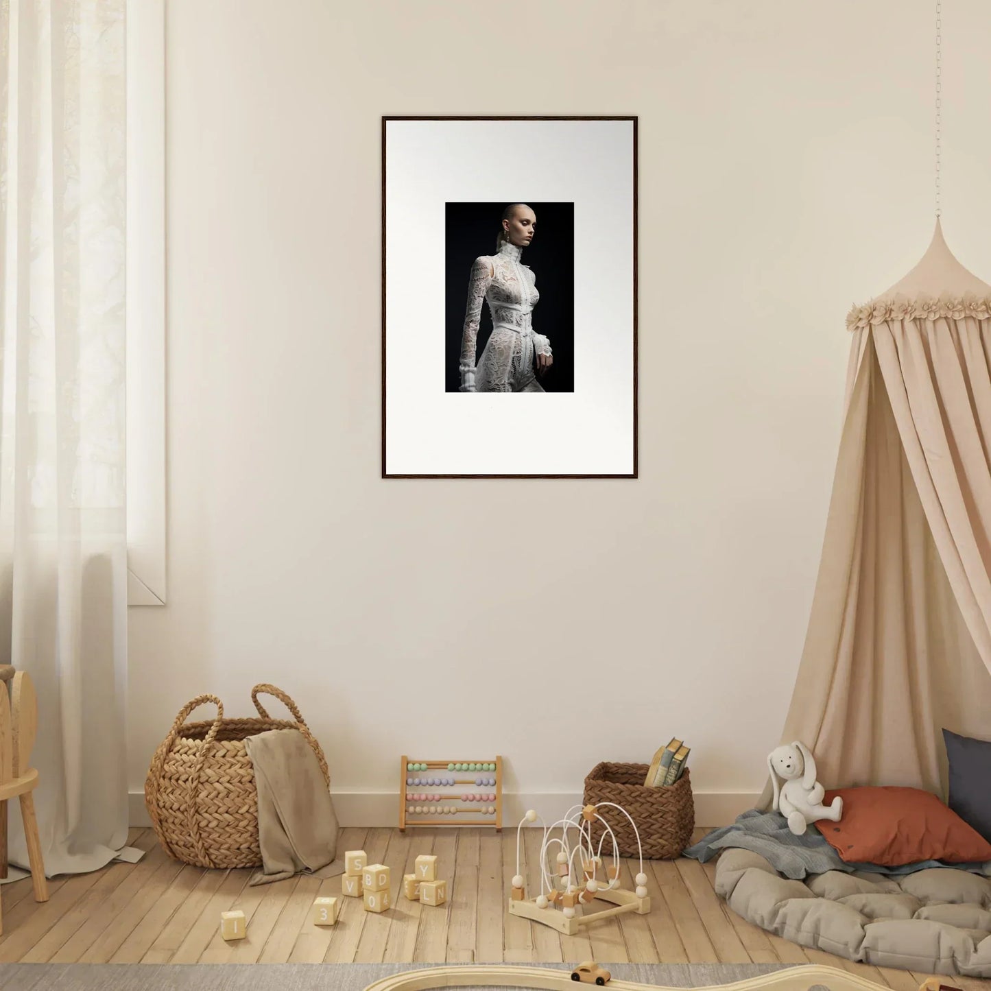 Framed black and white portrait photograph of a person in a white dress.