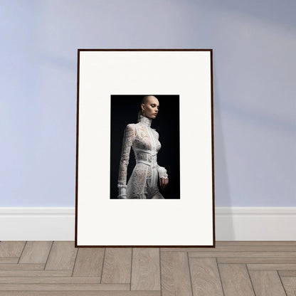 Framed black and white photograph of a person wearing an elegant white lace dress.