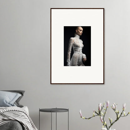 Framed portrait photograph of a person wearing an elegant white lace dress.