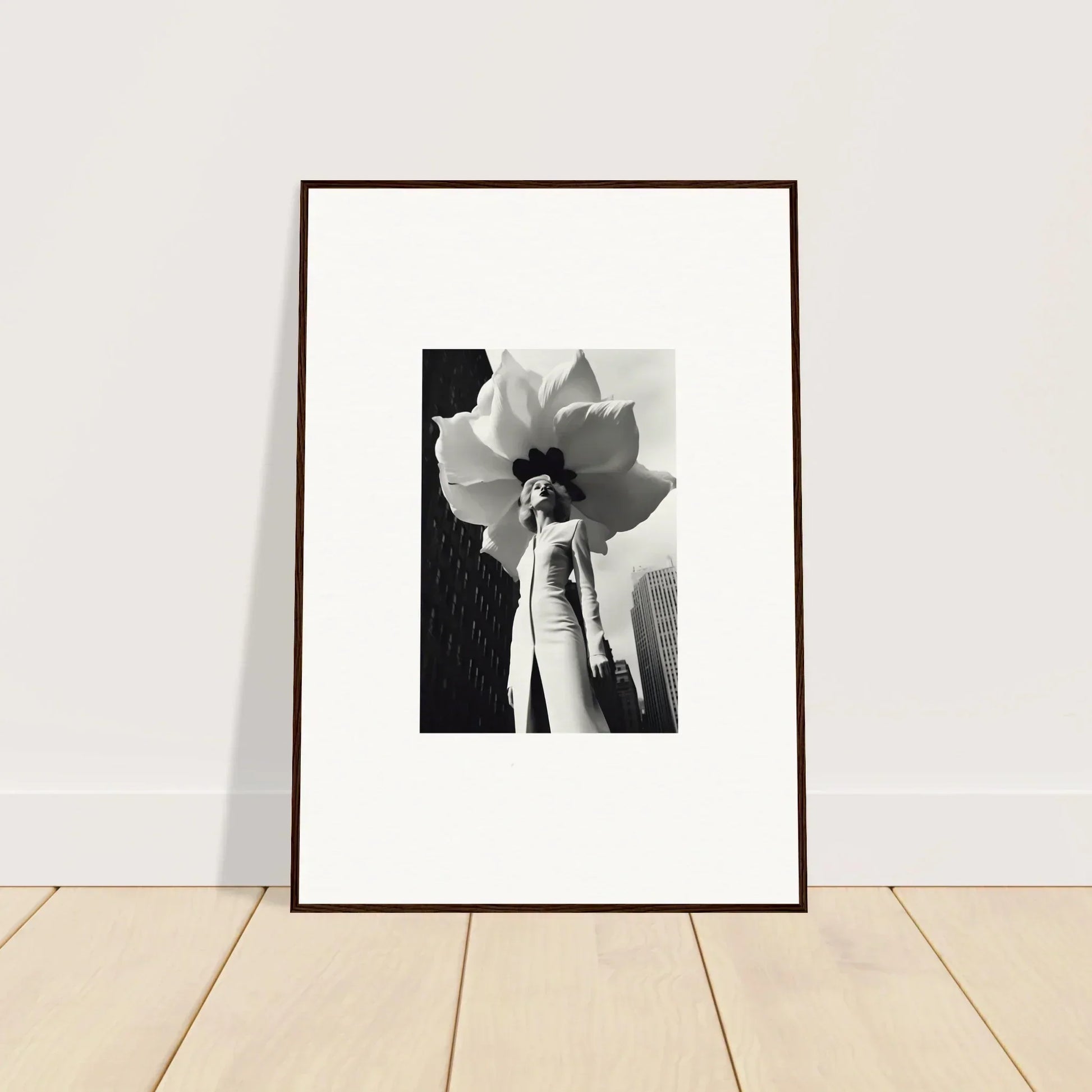 Framed black and white canvas print of a woman with a giant flower for room decoration