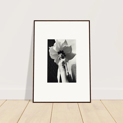 Framed black and white canvas print of a woman with a giant flower for room decoration