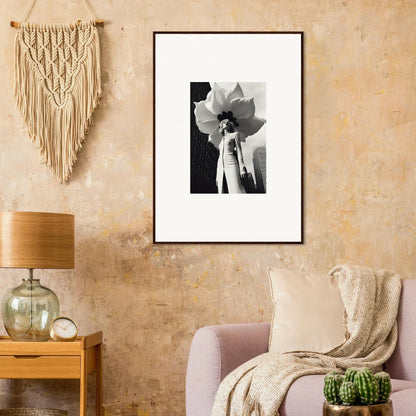 Framed black and white canvas print of a blossom persona with a large flower