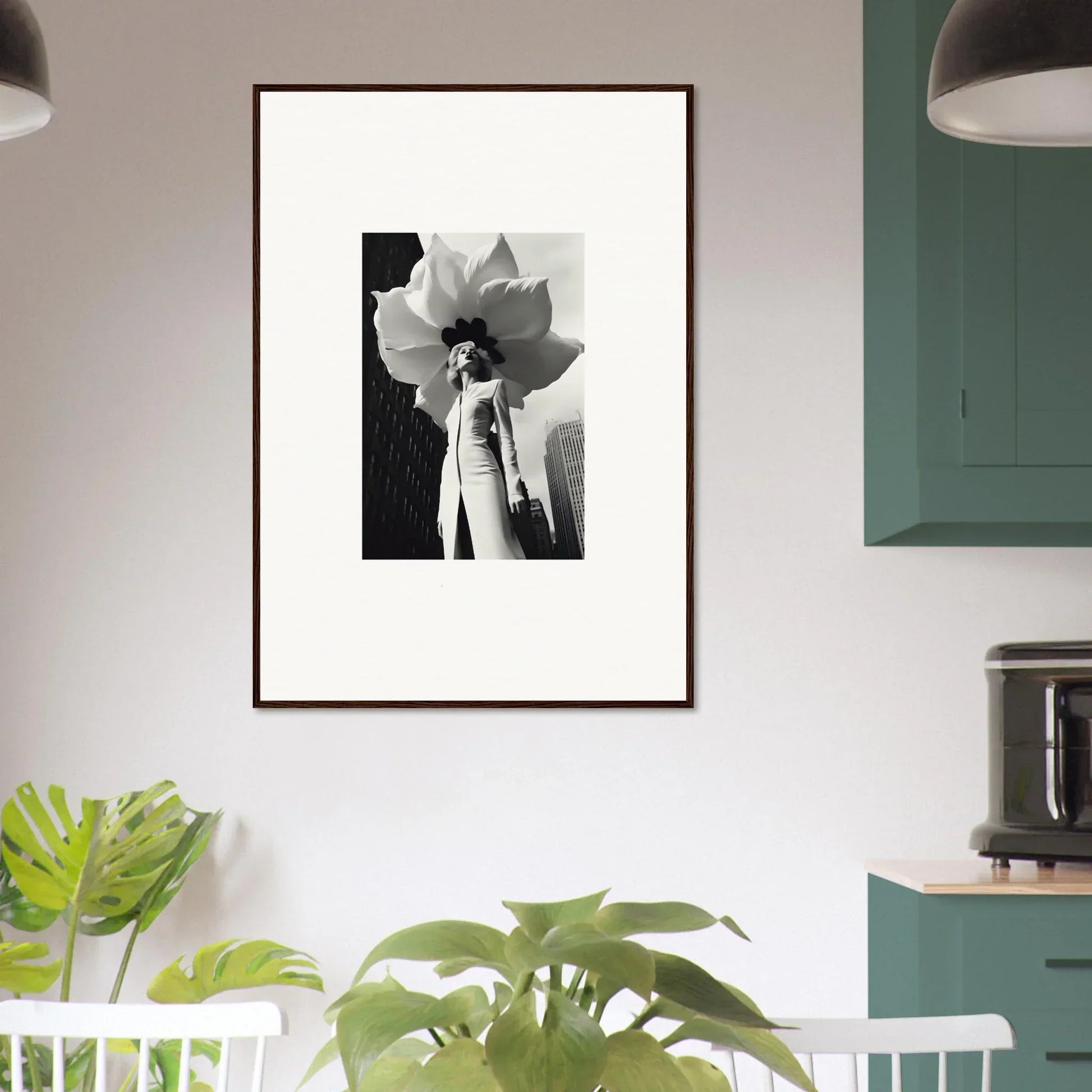 Framed black and white canvas print of a blossom persona with a flower in front of their face