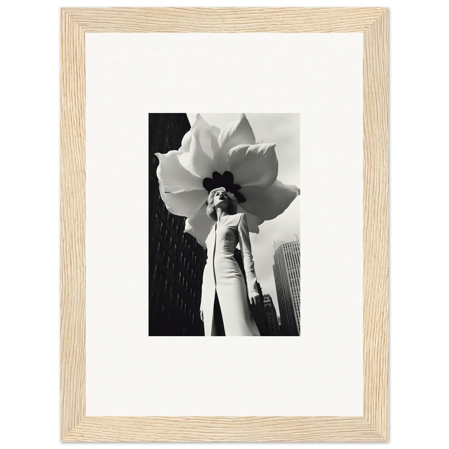 Black and white photo of a person in a giant flower hat, perfect for blossom persona decor