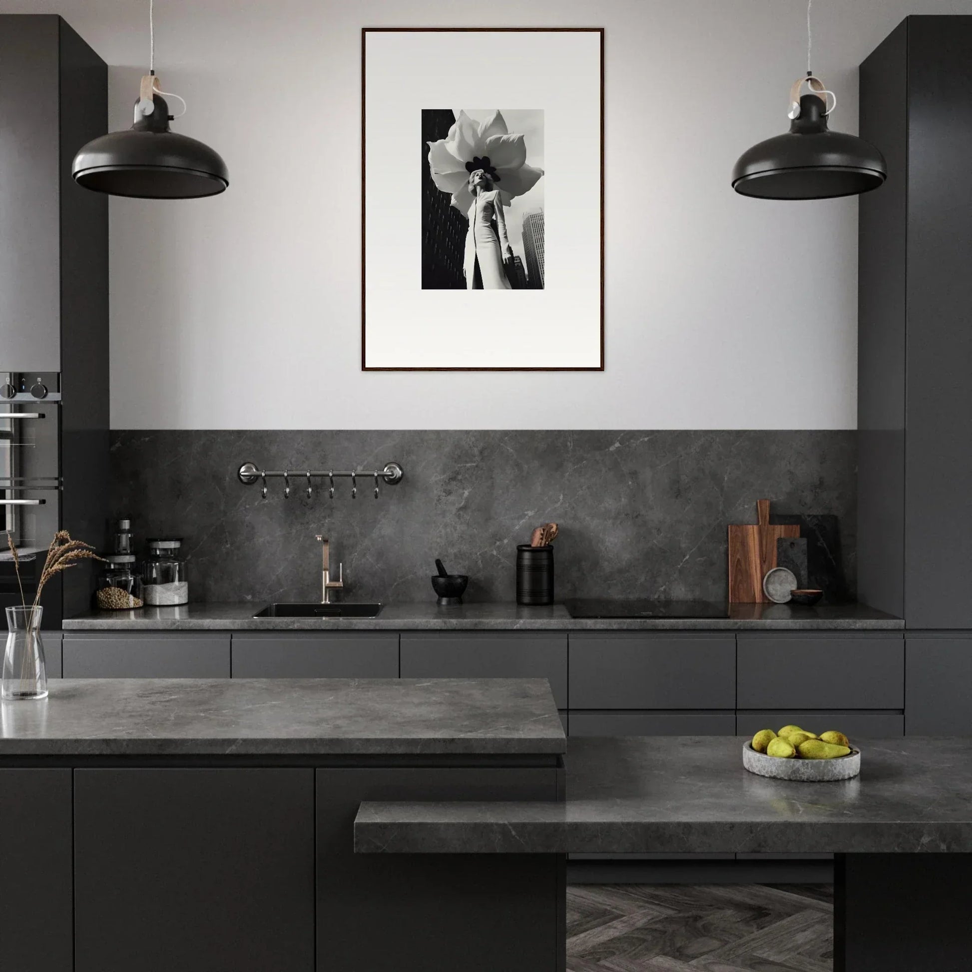 Stylish monochromatic kitchen with dark cabinetry and a bloom-inspired canvas print