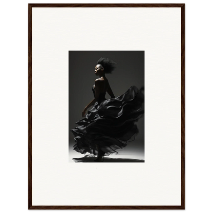 Black-and-white photograph of a flamenco dancer in motion, her dress swirling dramatically.